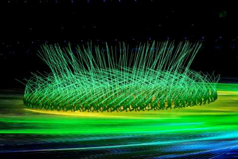 Winter Olympics begin with opening ceremony light show as Team GB stars wrap up warm in freezing..