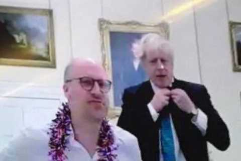 Boris Johnson pictured at Downing Street Christmas quiz next to bottle of bubbly – but No10 say it..