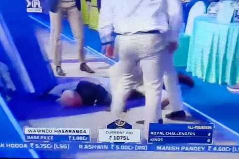 IPL auctioneer Hugh Edmeades faints live on TV in shocking scenes but Brit, 62, is reportedly..