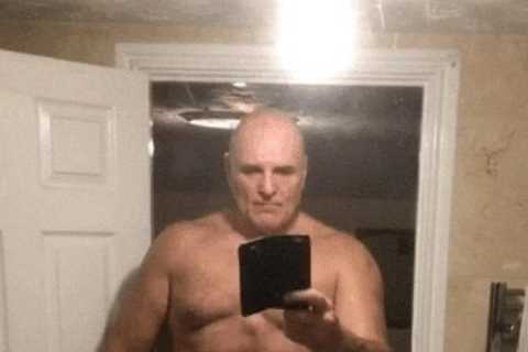 John Fury shows off bulking abs aged 57 in bathroom selfie after training with son Tyson ahead of..