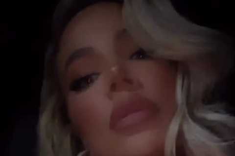 Khloe Kardashian flaunts cleavage in black strapless dress for wedding after sparking concern over..
