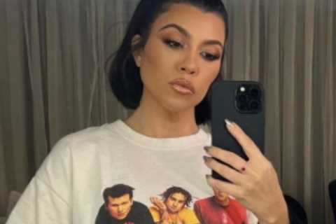 Kourtney Kardashian wears baggy Blink-182 tee as fans think she’s pregnant with Travis Barker’s baby