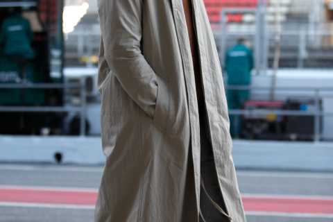 Watch cheeky Lewis Hamilton peer into Red Bull garage on spy mission on first day of F1 testing..