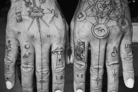 F1 star Lewis Hamilton shows off cryptic new hand tattoos in now-deleted post on Instagram
