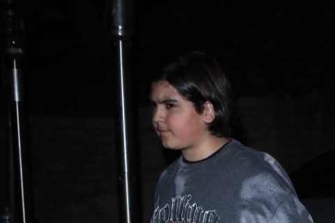 Kourtney Kardashian’s son Mason, 12, looks unrecognizable in rare appearance as he supports Travis..