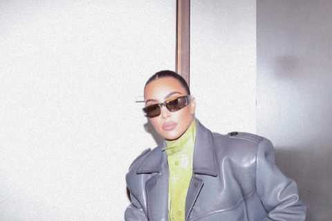 Kim Kardashian poses in full green latex suit in new photos as she continues to stun amid drama..
