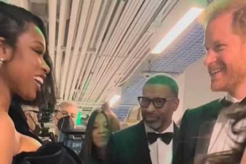 Prince Harry hugs singer Jennifer Hudson after mingling with US stars at NACCP awards