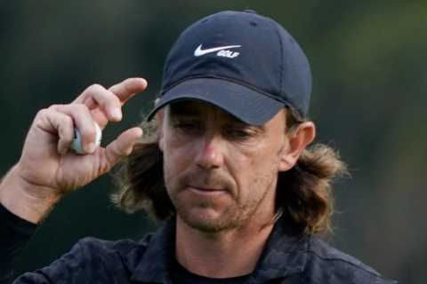 Tommy Fleetwood takes Players Championship lead despite rain making him wait FOUR HOURS for a..