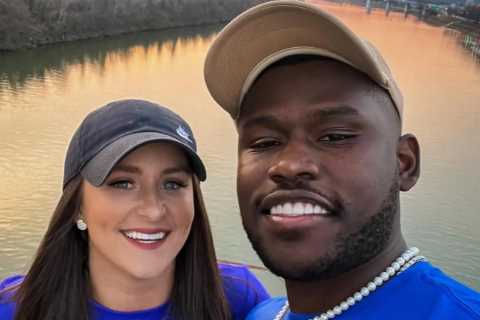 Teen Mom Leah Messer covers her stomach in baggy T-shirt for selfie with Jaylan Mobley as fans..