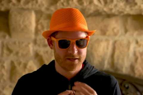 Moment Prince Harry dresses in all-orange &amp; speaks Dutch in Invictus Games vid after snubbing..