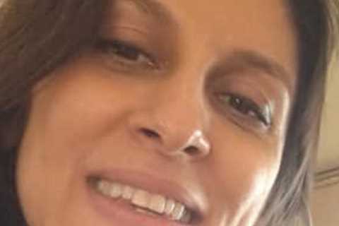 Nazanin Zaghari-Ratcliffe beams from safety of the skies as she heads home to Britain after six..