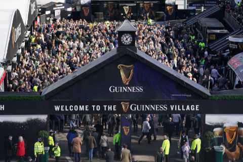 Cheltenham Festival’s Guinness Village packed at 11am as punters get into Irish spirit on St..