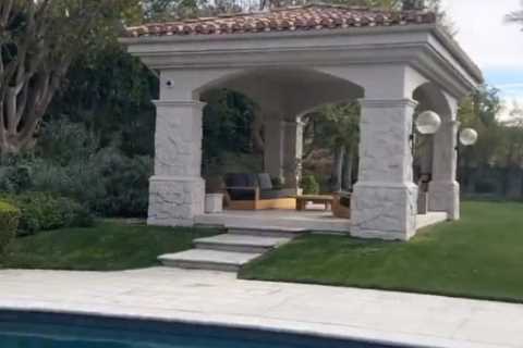 Travis Barker’s daughter Alabama, 16, gives tour of huge pool, hot tub &amp; sprawling gardens at..