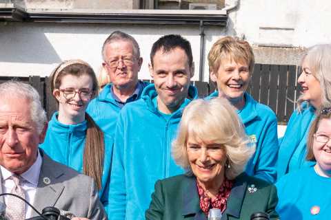 Charles &amp; Camilla kick-start Northern Ireland tour by hopping on a tricycle