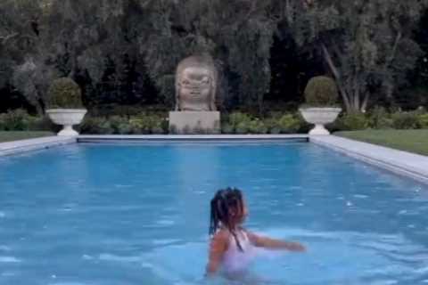 Khloe Kardashian shows off massive pool in the lavish backyard of her $17M mansion as daughter True,..
