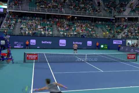 Watch tennis star JJ Wolf use WRONG HAND to hit incredible winner after scintillating rally with..