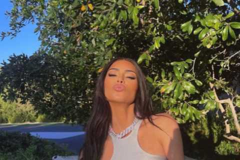 Kardashian fans claim Kim is having a ‘midlife crisis’ as star shows off giant chain with her name..