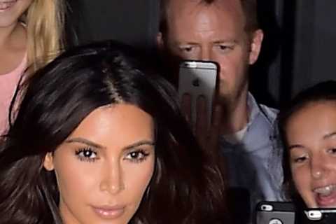 Kardashian fans think Kim looked better with thinner lips as she shows off plumpest pout ever in..