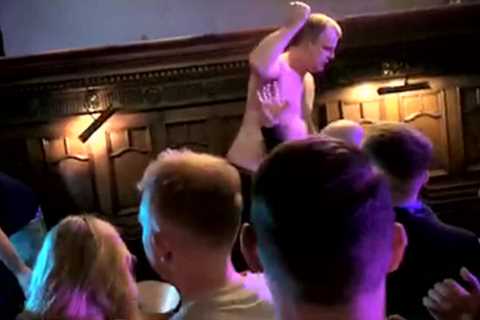 Watch moment Corrie’s Simon Gregson is thrown out of bar after stripping to waist and screaming..