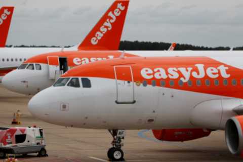 Travel chaos as EasyJet cancels ONE HUNDRED flights tomorrow due to Covid leaving passengers furious