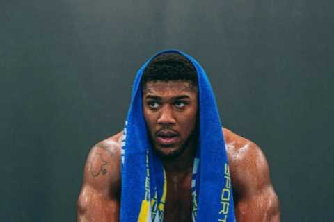 Anthony Joshua blasted for ‘staged photo shoot’ and ‘spraying water on himself’ by former UFC star..