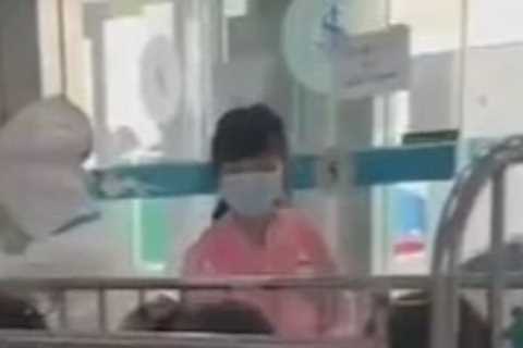 Inside world’s strictest lockdown as babies are separated from parents and Shanghai streets are..