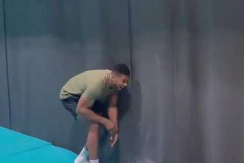 Watch cheeky Anthony Joshua give training pal huge fright with star in good spirits ahead of..
