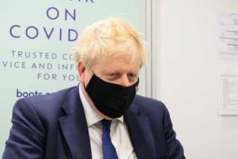 Facemasks and social distancing rules should be brought back to protect the NHS after Covid spike,..