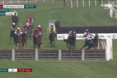 Watch absolute chaos during race as horse smashes through barrier, another brutally unseats jockey..