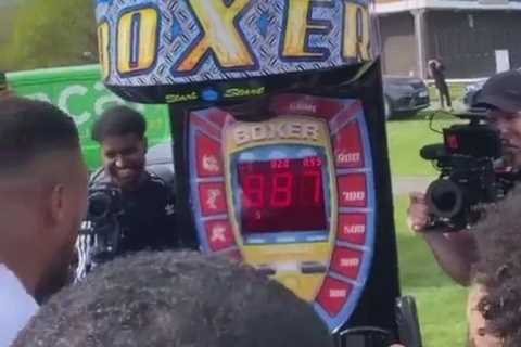 Watch Anthony Joshua show off his explosive punching power on arcade boxing machine during Easter..