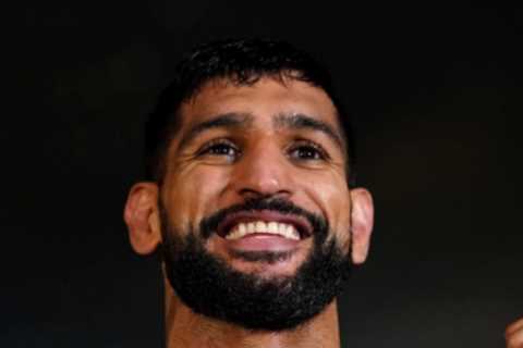 Amir Khan has gun pointed in his face by two robbers who stole his luxury watch as he crossed the..