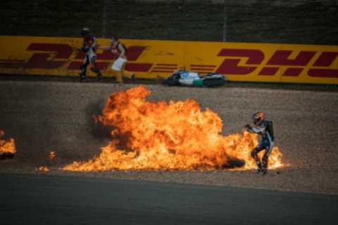 Horror mass Moto2 crash sees bike burst into fireball as riders run away from blaze with debris..