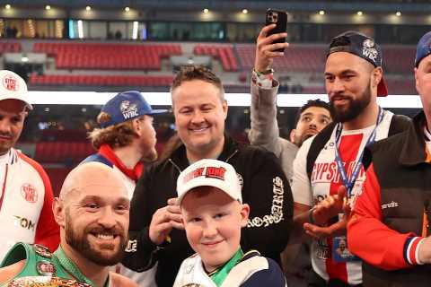 Heartwarming moment Tyson Fury invites young fan into ring after promising to raise money for new..