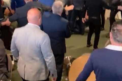 Huge fight breaks out at Sandown races as one man KOs another with sucker punch &amp; cops..
