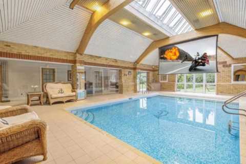 Inside mansion rented by Tyson Fury for £1,200 a night for Whyte fight with giant TV screen over..