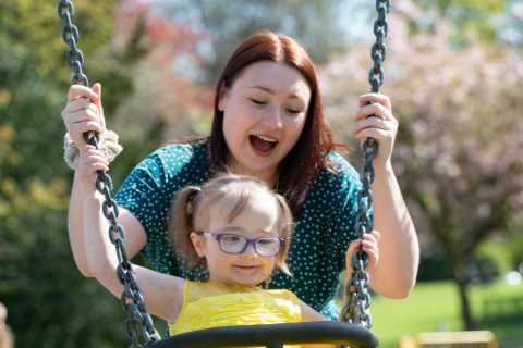 Brave cancer survivor, 4, plays on swing after beating brain tumour size of golf ball