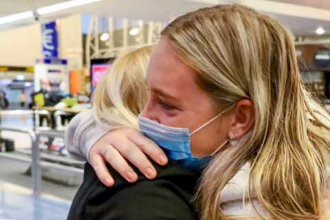 Families reunited at last after New Zealand finally reopens borders for first time since Covid