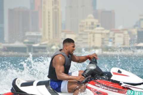 Anthony Joshua goes jet-skiing and shows off huge ripped body on holiday in Dubai ahead of..