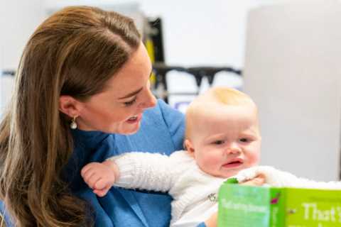 Prince William jokes about Kate Middleton feeling broody as she enjoys cuddles with a baby during..