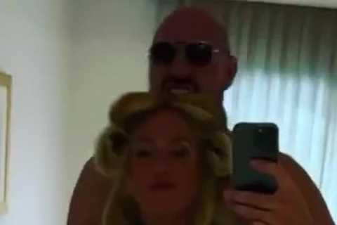 Tyson Fury dances topless with wife Paris ahead of night out as heavyweight champion continues to..