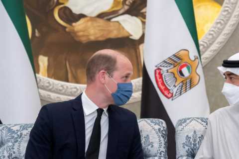Prince William wears face mask as he visits United Arab Emirates on behalf of the Queen