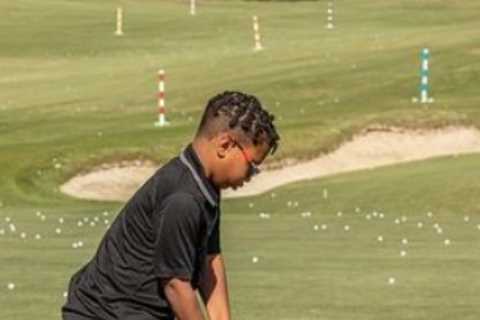 Mike Tyson takes son Morocco, 11, to play golf as boxing legend tries hand at new sport