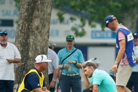 Aaron Wise luckily avoids injury after being hit on the HEAD from wayward Cameron Smith drive as he ..
