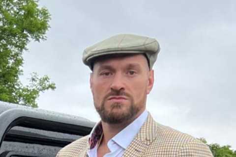 ‘Lord of the Ring’ – Tyson Fury suited and booted as he poses alongside luxury jeep while enjoying..
