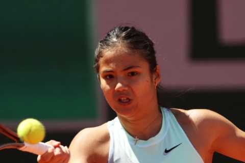 John McEnroe slams Emma Raducanu for axing coaches and says British star is crumbling under..