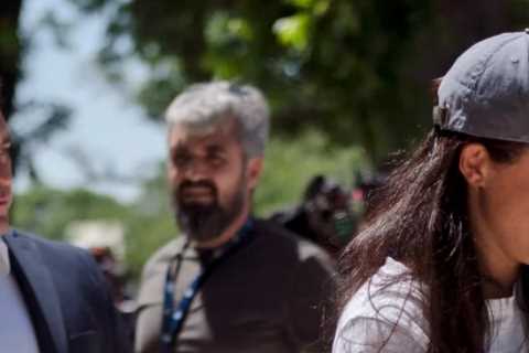 Meghan Markle lays flowers at Texas school shooting memorial in surprise appearance days after dad..