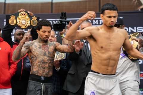 Watch Gervonta Davis push Rolando Romero off stage during weigh in as Mike Tyson’s ex-coach makes..