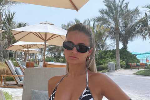 Molly-Mae Hague shows off her figure in very revealing zebra-print bikini in sizzling beach snaps