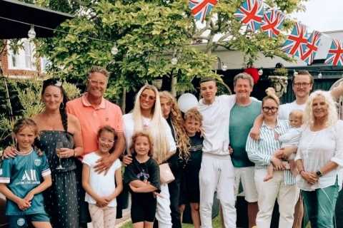 Katie Price poses with Junior, Princess, Jett and Bunny in adorable family picture as she toasts..