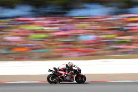 Horror first-corner crash at MotoGP Catalan GP sees rider smash his face into rival’s tyre with..